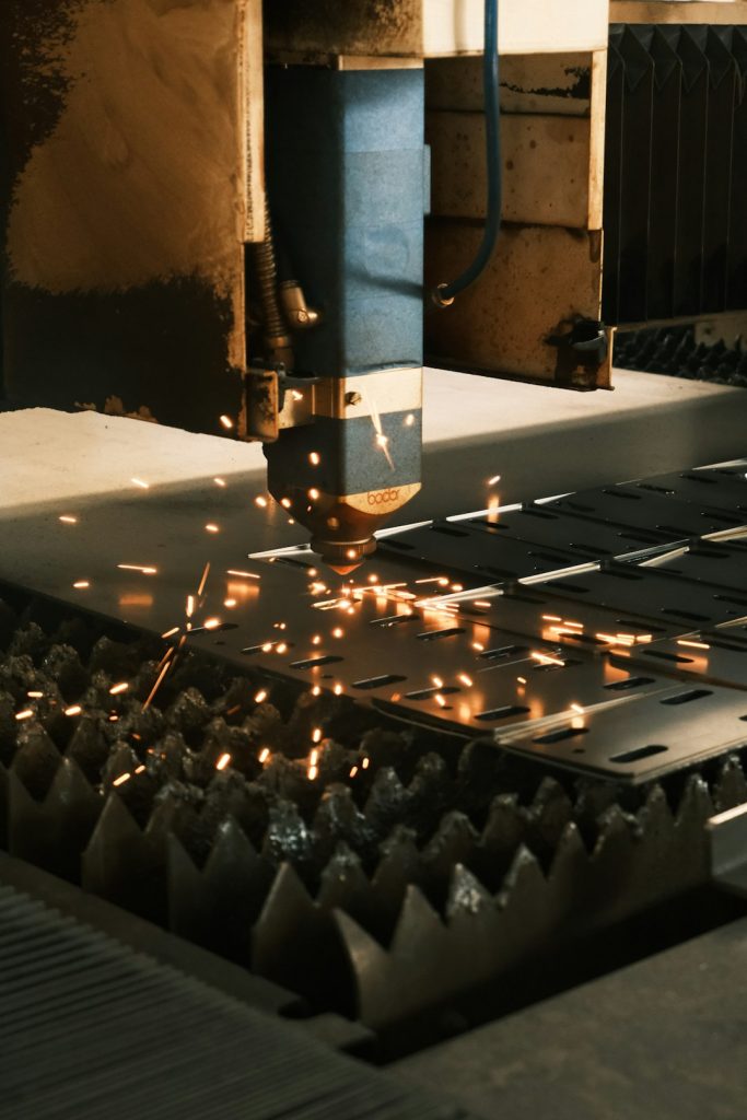 a-machine-cutting-a-piece-of-metal-with-sparks-thdb7o0nlyc
